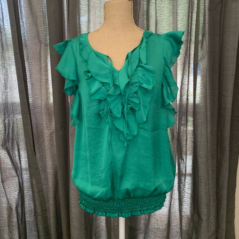 Gorgeous green ruffled blouse